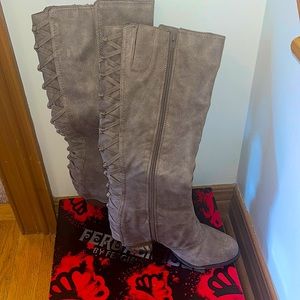 I love these boots! I only wore them once they are too small. Knee high.